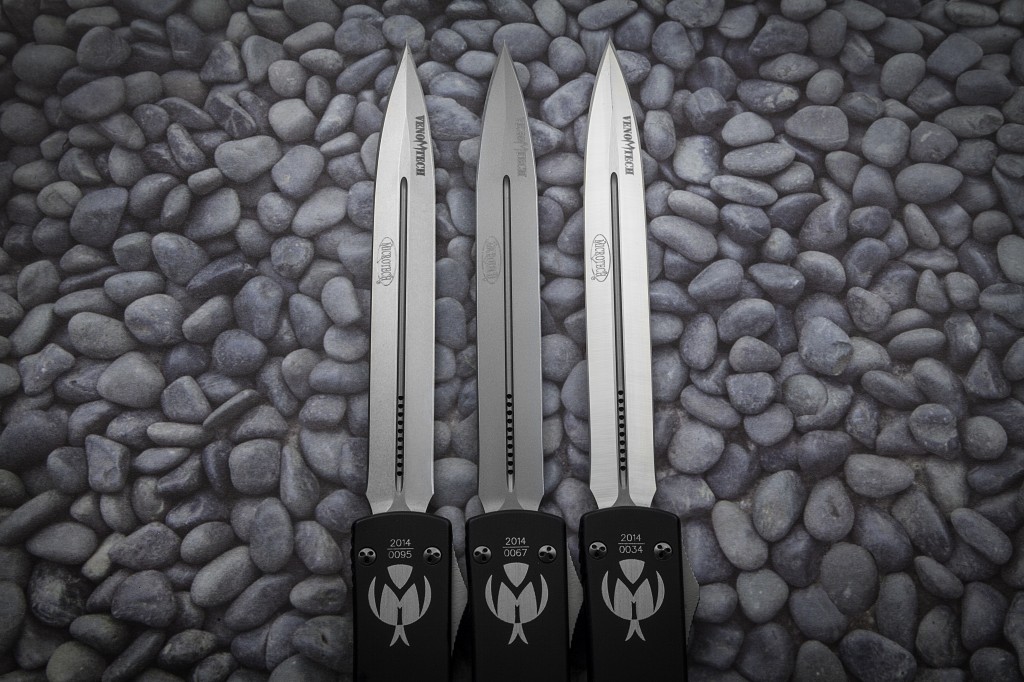 Three Microtech Venomtech OTF Knife Fully Extended